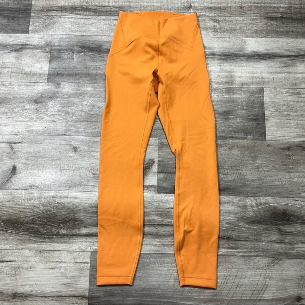 Lululemon Athletic InStill HR Tight Yoga Pants 25"
Autumn Orange Women's Sz 4